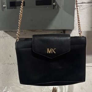 Preowned Michael Kors black leather clutch crossbody bag with gold-tone hardware